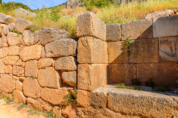 istock Ancient ruins of Delphi, an archaeological site in Greece, at the Mount Parnassus. Delphi is famous by the oracle at the sanctuary dedicated to Apollo. UNESCO World heritage 824328616