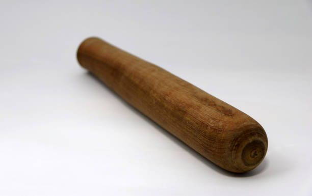 istock wooden pestle isolated on White Background. 824333734