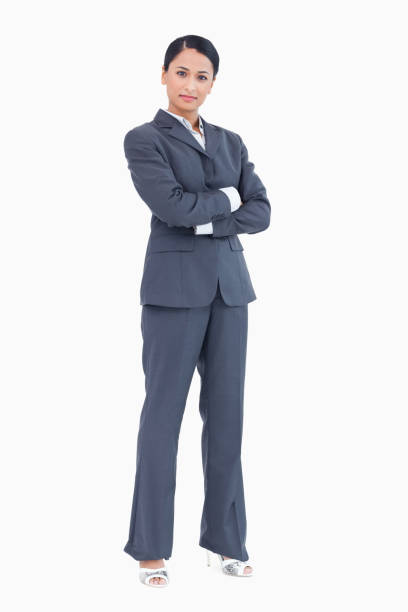 istock Confident standing businesswoman with arms folded 824340526
