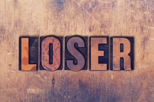 istock Loser Theme Letterpress Word on Wood Background 824341220