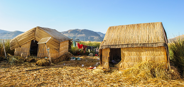 House in Uros, artificial islands made of floating reeds, Lake Titicaca, Peru, South America.