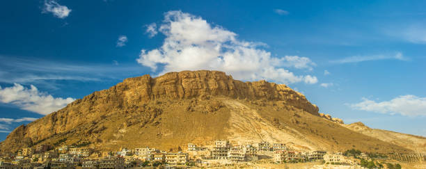 istock Town near the rock in Syria 824355656