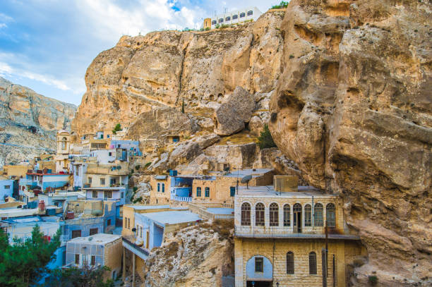 istock House built in the rock, Maalula, Syria. 824355904