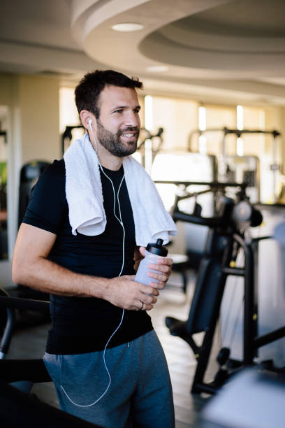 istock Man in the gym having break 824358686