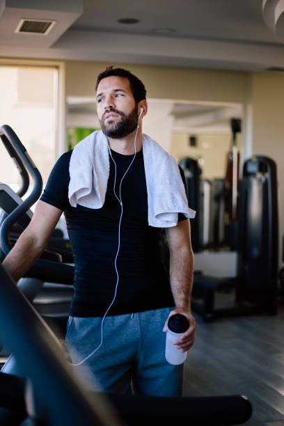 istock Tired man after training in gym 824369818