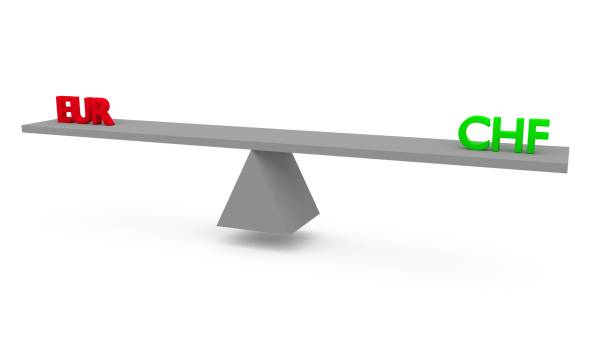 istock Currencies on seesaw 824370350
