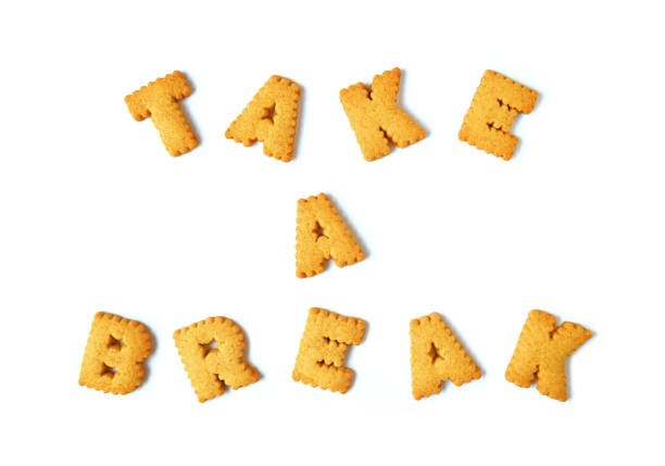 istock The word TAKE A BREAK spelled with alphabet shaped biscuits on white background 824407782