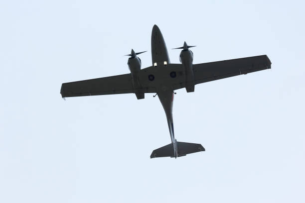 istock twin-engine light aircraft flying in the sky 824411232