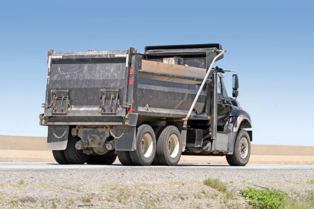 istock Dump Truck On Highway Travelling To A Construction Site 824430290