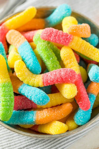 istock Sweet Sour Neon Gummy Worms 824430336