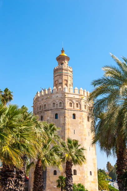 istock Torre de Oro (Golden Tower), a dodecagonal military watchtower in Seville, Spain 824557726