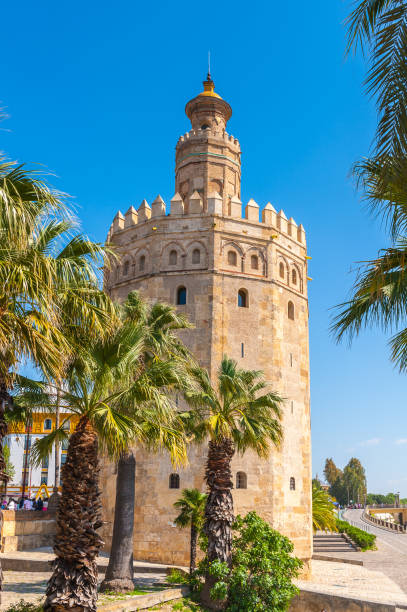 istock Torre de Oro (Golden Tower), a dodecagonal military watchtower in Seville, Spain 824557852