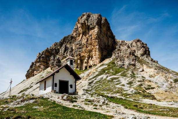 istock chapel at Dolomites in Trentino 824557994