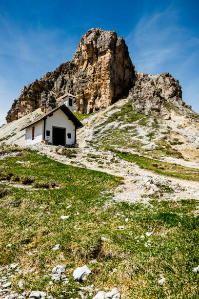 istock chapel at Dolomites in Trentino 824560010