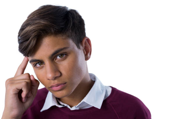 istock Teenage boy standing against white background 824562844