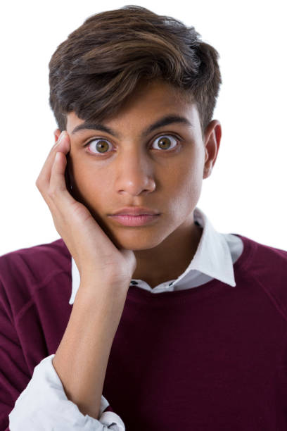 istock Shocked teenage boy standing against white background 824562920