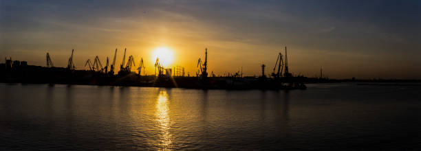 istock Cranes in Odessa dock on sunset 824563154