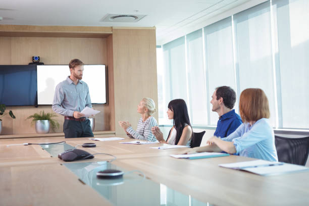 istock Business people discussing at conference table during meeting 824563784