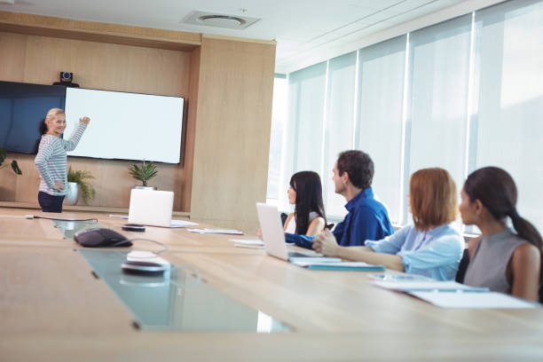istock Business colleagues at conference table during meeting 824563932