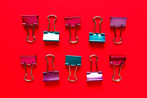 istock flat lay regular composition of colorful paper clips 824563968