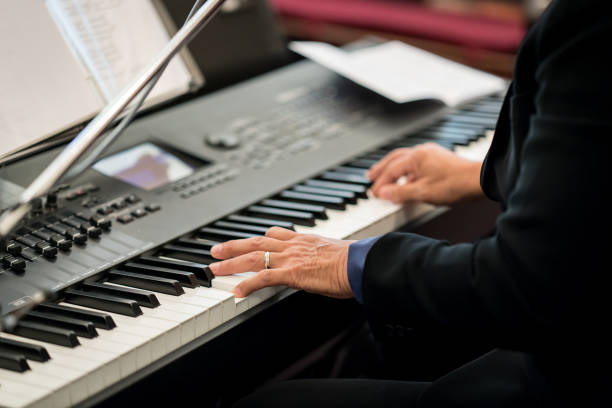 istock Pianist playing electric piano 824565444