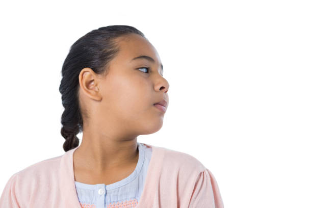 istock Girl standing against white background 824572226