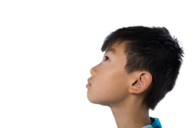 istock Cute asian boy looking up 824572866