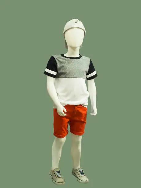 Photo of Child mannequin dressed in casual clothes.