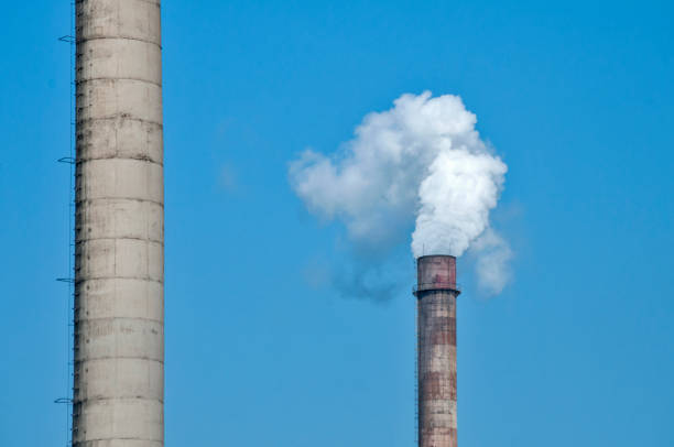 istock Industrial chimneys with smoke 824573450