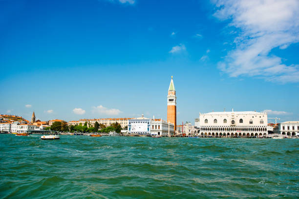 Venice, Italy - 14 June 2016: Seaside view of Palazzo Ducale Museum and San Marco Campanile in Venice, Italy, June 19, 2016