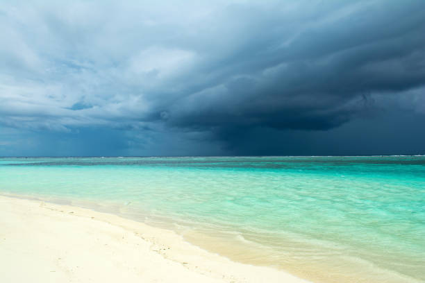 istock Cloudy landscape of Indian ocean sandy beach  before the storm 824574152