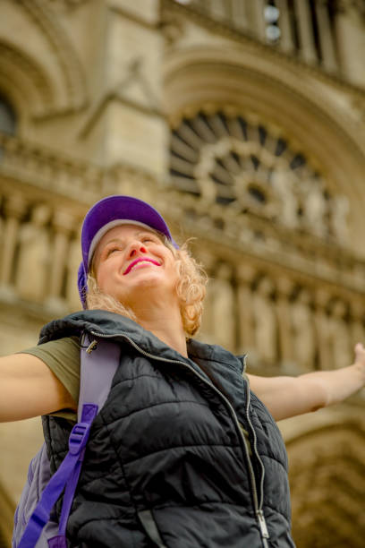 istock Notre Dame enjoing woman 824574738