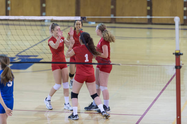 istock Girls high school volleyball team 824576394