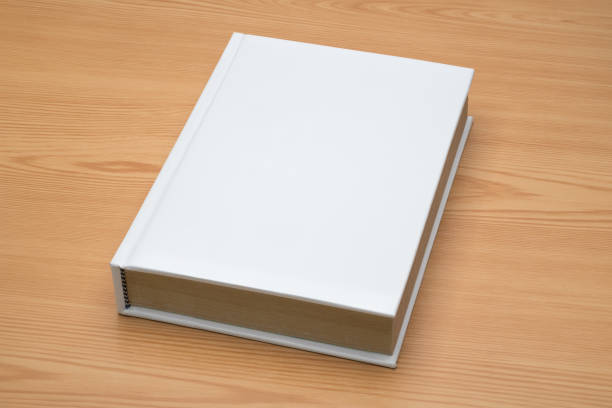 istock Mock up book on wood background 824576718