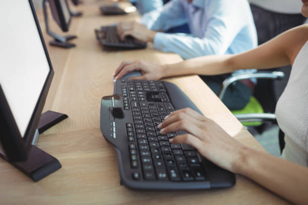 istock High angle view of businesswoman working on computer at call center 824579984