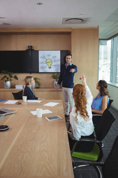 istock Business people discussing at conference table 824580064