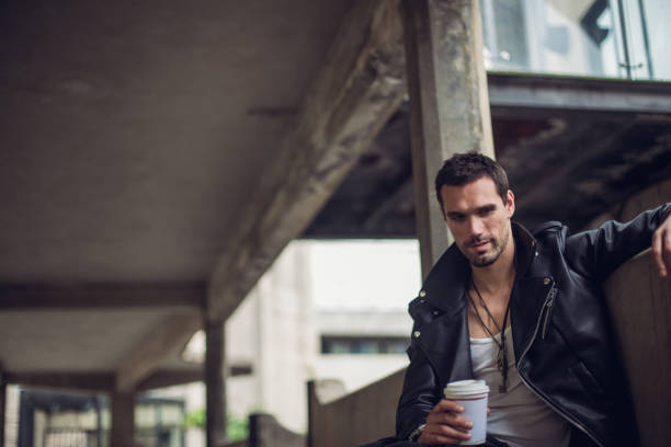 istock Man having takeaway coffee outdoors 824580356