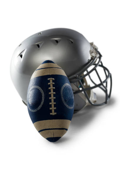 istock Close-up of helmet and football 824580708
