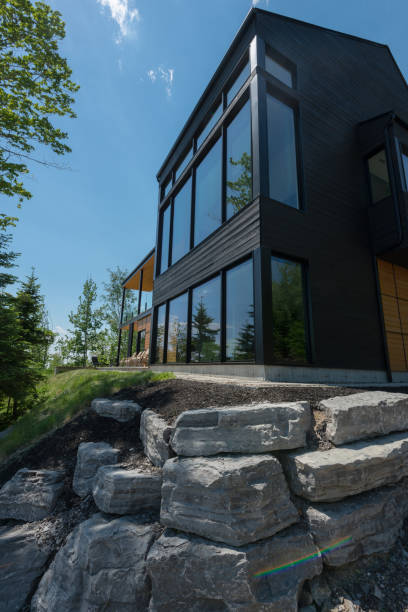 istock Beautiful modern house in the forest. 824581150