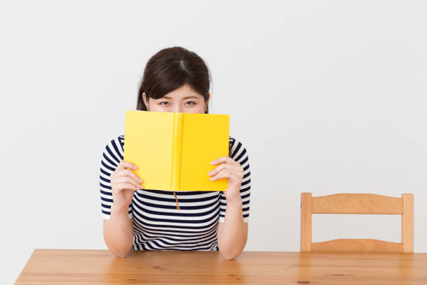 istock woman who reads a book 824582134