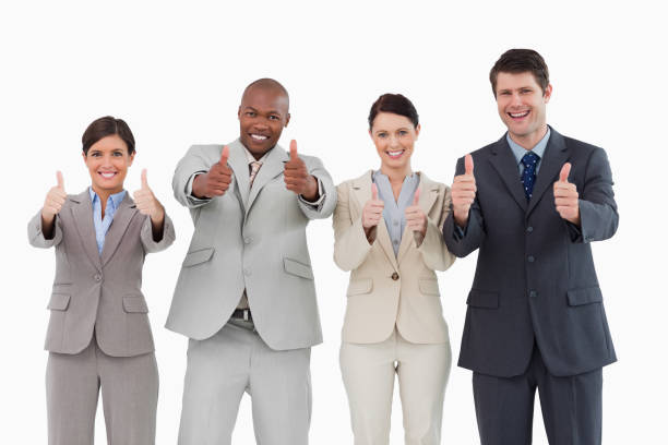 istock Smiling sales team giving thumbs up 824582396