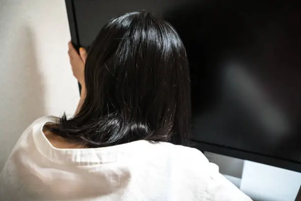 Photo of Businesswoman looking at the display