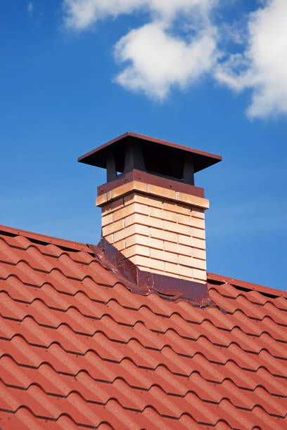 istock Modern Ceramic Tile Roof with Chimney against the Sky. 824585982