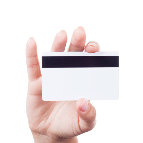 istock Woman Hand Holding White Blank Credit Card. 824586418