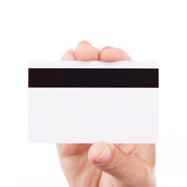 istock Woman Hand Holding White Blank Credit Card. 824586496