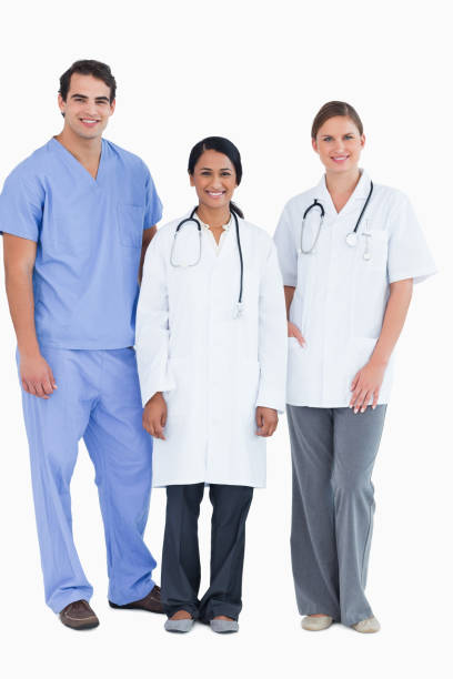 istock Smiling young medical staff standing together 824588540
