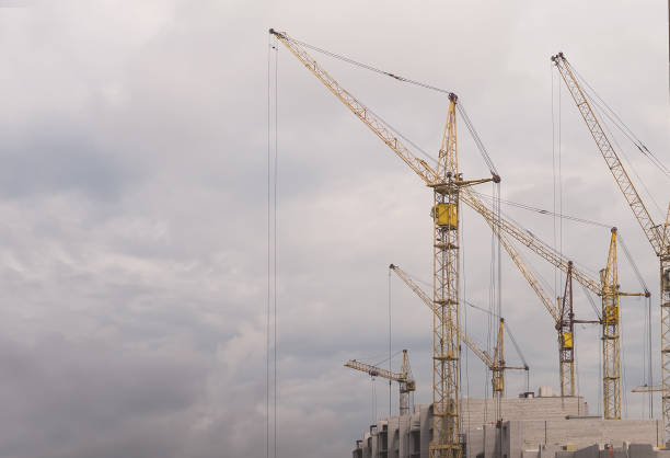 istock vintage tone image of yellow crane 824590704
