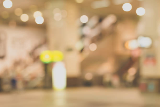 istock Blurred image of subway station hall with escalators. 824593742