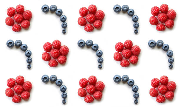istock Pattern of fresh raspberries and blueberries 824599710