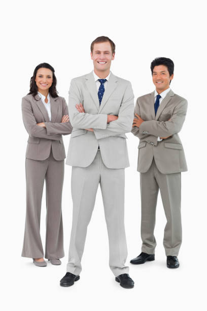 istock Smiling business team with folded arms 824605914